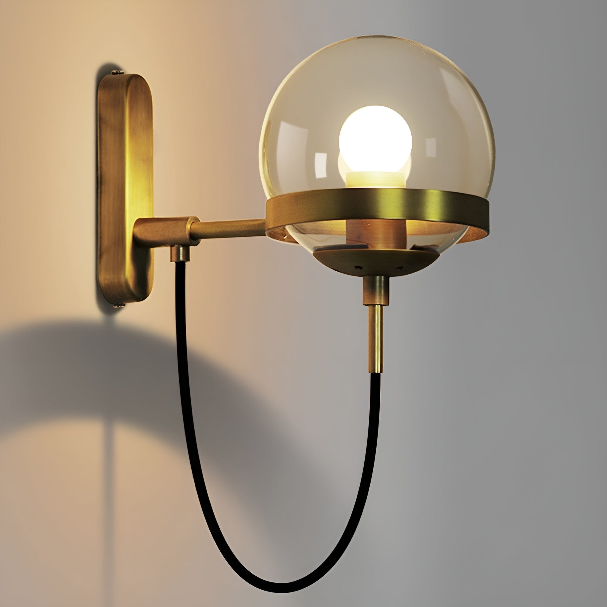Arcluna – Wall Sconce with Modern Glass Globe Design for Warm Ambient Lighting